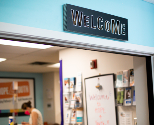 Welcome sign at the Drop-In Center